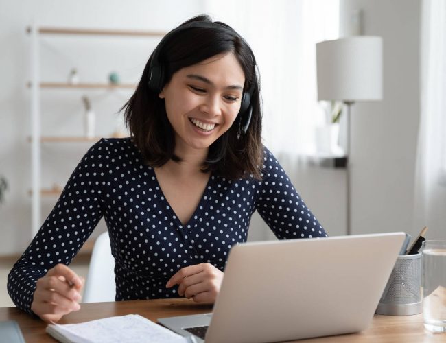 Woman conducting job interview with candidate in office.